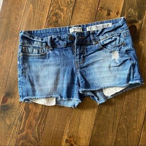 Peekaboo Lace Pocket Jean Shorts